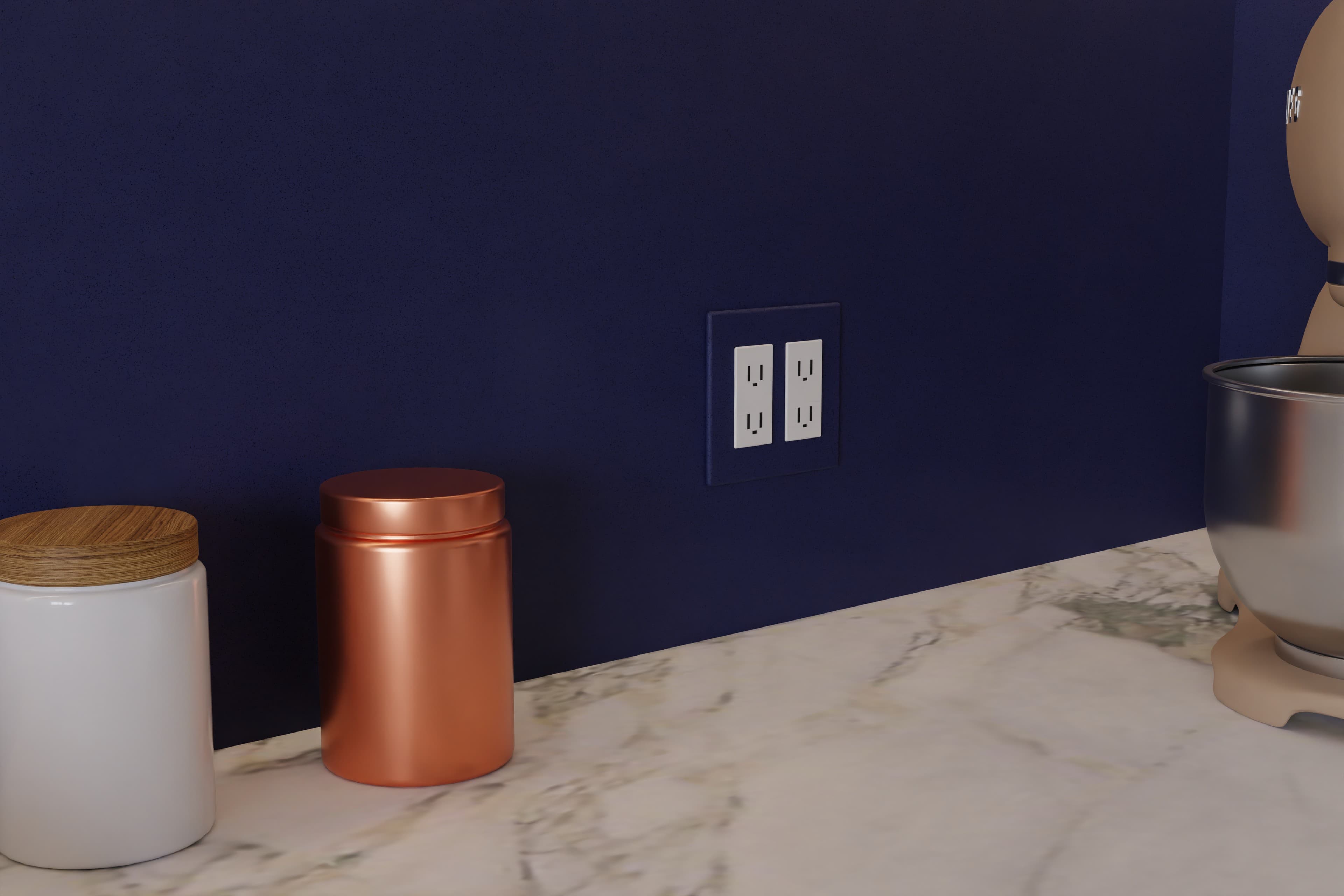 Navy blue aluminum backsplash panel up close beside an outlet